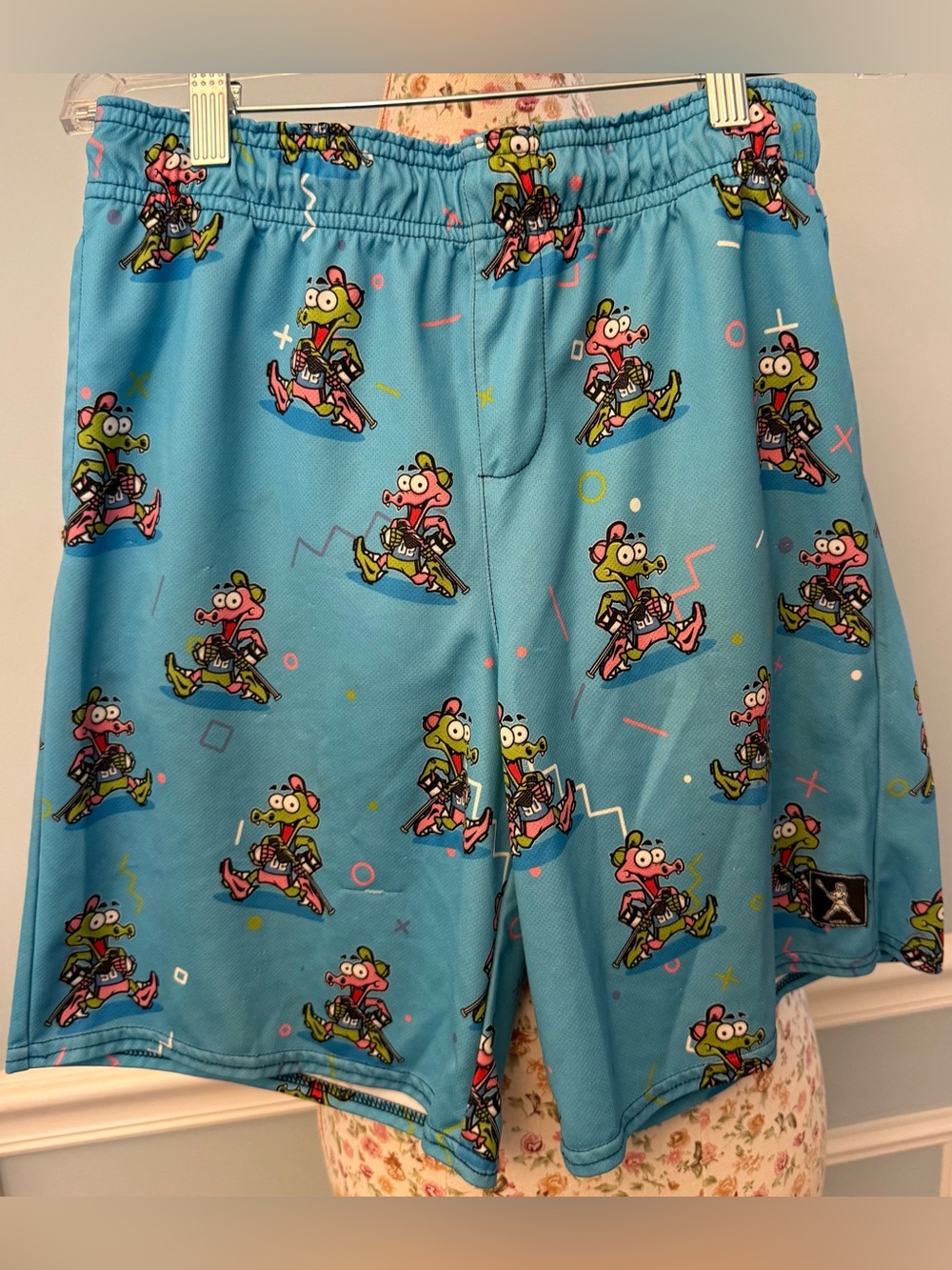 Lacrosse Unlimited graphic mesh athletic shorts all-over cartoon character print